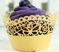 Detail of yellow laser-cut cupcake wrapper with butterfly and rose lace patterns - 5*5*8CM / Gold