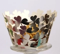Macro shot of silver hollow clover cupcake wrapper with a golden chocolate ball - 5*5*8CM / Reflective Silver