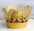 Laser cut golden cake wrapper with intricate bird and vine patterns for wedding decor - Gold