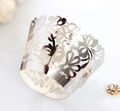 Silver laser-cut floral cupcake wrappers with metallic finish for elegant party decor - Reflective Silver