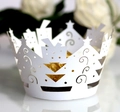 Intricate laser-cut white paper crown cake wrappers with star patterns for Christmas party - White