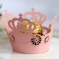 Pink laser cut cupcake wrappers with hollow carriage and crown design for party decor - Pink