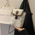 Mini white faux fur crossbody bag with leather trim and vintage horn buckle detail - White