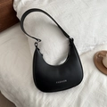 Chic black crescent hobo bag with silver FASHION lettering and matte leather finish - Black