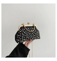 Detail of a black pleated evening bag with pearls, gold heart clasp and chain strap - Black