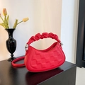Red lychee textured crossbody bag with stylish ruched handle and metal chain link - Red