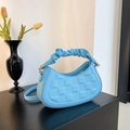 Light blue quilted faux leather crossbody bag with pleated handle and silver hardware - Blue