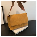 Detail view of ginger matte texture shoulder bag with brown strap and gold metal buckle - Brown