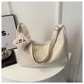 Detail of off-white textured leather hobo bag with cute plush star pendant accessory - White With Pendant