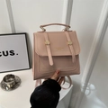 Pink faux leather college style satchel bag with flap and gold rivet details - Pink