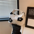 Plush hobo bag with black and white floral cow print pattern and white leather handle - Black Floral