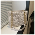 Chic beige quilted chain bag with gold metal hardware and textured faux leather finish - White