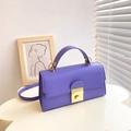 Chic purple structured handbag with top handle and gold lock detail for women - Purple