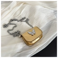 Close-up of gold mini chain bag with white butterfly motif and silver chunky chain strap - Gold