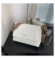 Detail of white litchi pattern leather tote with striped wide fabric shoulder strap - White