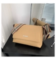 Close-up of khaki crossbody bag with litchi grain leather and striped wide strap - Brown