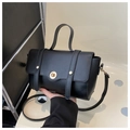 Classic black square handbag with gold round lock and top handle in a minimalist style - Black