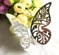 Macro view of 3D laser-cut butterfly wall stickers with silver reflective finish - Reflective Silver