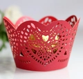 Detailed laser-cut heart pattern on red cupcake wrapper with intricate lace hollow design - Pearlescent Red