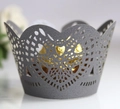 Close-up of laser-cut heart lace pattern on a dark grey cupcake wrapper for weddings - Silver Charcoal