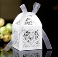 Elegant white laser-cut heart wedding favor box with a delicate white organza ribbon bow - White