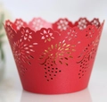 Red laser-cut floral cupcake wrappers with intricate grape vine patterns for party decor - Pearlescent Red
