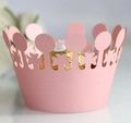 Detailed view of laser-cut crown paper cupcake wrappers in soft pink for party decoration - Pink