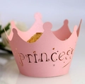 Detail of pink crown cupcake wrapper with gold princess text and chocolate inside - Pink / 5cm