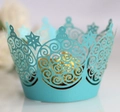 Laser-cut light blue cupcake wrappers with crown and snowflake patterns for wedding decor - Tiffany Blue