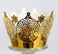 Elegant laser-cut hollow golden crown cupcake wrappers featuring stars and spiral patterns - Reflective Gold