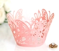 Pink laser-cut cupcake wrapper with elegant butterfly lace pattern for wedding decor - Pink