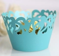 Close-up of Tiffany blue laser-cut heart cupcake wrapper with elegant lace details - 5cm / Turquoise Blue
