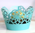 Close-up of laser-cut light blue floral lace cupcake wrappers for weddings - 5cm / Tiffany Blue