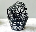 Detail view of laser-cut black paper cupcake liners with intricate floral patterns - 5x5x8CM / Pearlescent Black