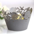 Macro shot of charcoal grey pearlescent paper cupcake wrapper with sea shell laser cutouts - 5cm / Silver Charcoal