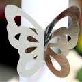 Elegant 3D butterfly napkin ring in silver mirror finish for wedding table decor - Reflective Silver