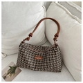 Details der Tweed-Schultertasche mit kariertem Muster und geknotetem Lederriemen - Schwarz