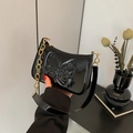 Glossy black patent leather underarm bag with butterfly embossing and gold chain - Black