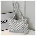 Detailed view of white faux leather tote bag and coin purse with black rhombic pattern - White