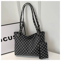 Detail view of large printed tote bag with matching zipper pouch in black and white pattern - Black