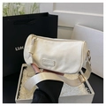 Bolso bandolera cilíndrico blanco mate minimalista con correa ancha de tela - Blanco Roto