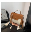 Brown leather and straw woven crossbody bag with round buckle and top handle design - Brown