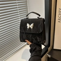 Elegant black pleated leather bucket bag with silver butterfly metal ornament - Black