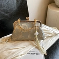 Silk embroidered clutch bag in sage green with gold floral pattern and long silk tassel - Green