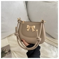 Khaki shoulder bag with golden metal bow decoration and knotted handles - Khaki