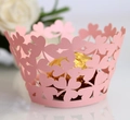Pink laser-cut four-leaf clover cupcake wrapper used as an elegant candy holder - 5cm / Pink