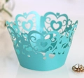 Detailed laser-cut heart pattern on pearlized light teal cupcake wrapper liners - Tiffany Blue