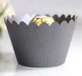 Macro shot of dark grey cupcake liner with scalloped edges and a premium matte finish - Silver Charcoal / 5cm