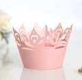 Detailed laser-cut crown pattern on light pink cupcake wrapper for wedding party decor - Pink