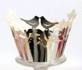 Laser-cut silver cupcake wrapper featuring intricate love birds and vine patterns - Reflective Silver
